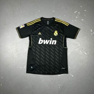 CAMISETA RETRÔ REAL MADRID 11/12 (PRETA)